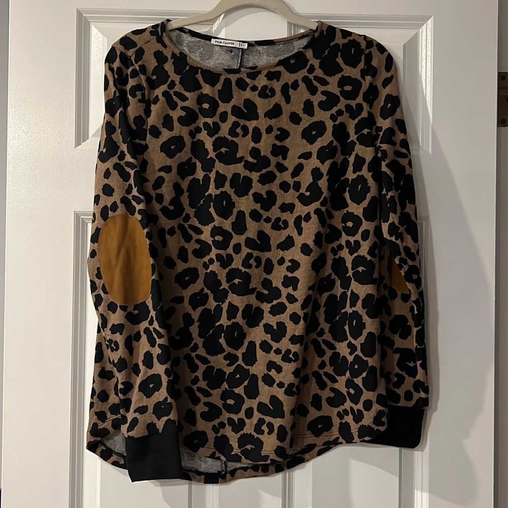 Cheetah print sweater with buttons down back and elbow pads